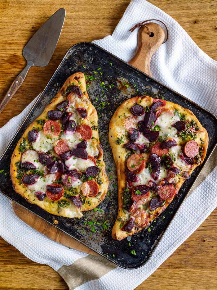 naan bread pizza with sweet chilli beetroot parsley capers pepperoni and mozzarella