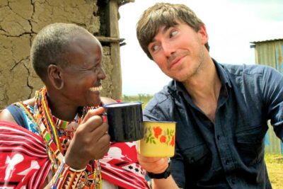 Simon Reeve enjoying a cuppa in Kenya