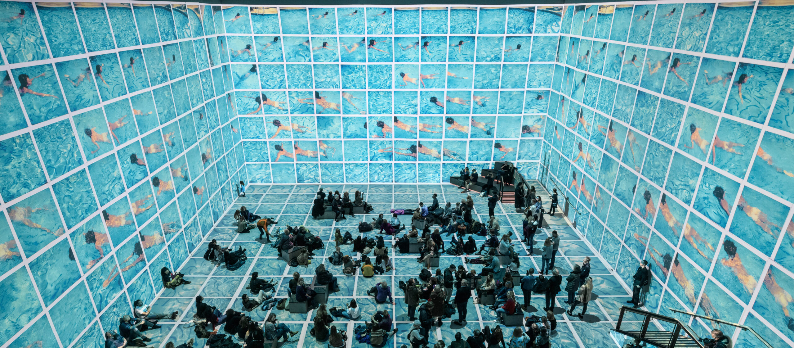 David Hockney - installation of his new Immersive work, “David Hockney: Bigger & Closer (not smaller & further away)” being projected at the new Lightroom venue near Kings Cross. In this photo, the ‘Gregory Swimming” sequence. Lightroom is an immersive collaboration between The Bridge Theatre Company (who formerly ran the National Theatre) and 59 Productions (world-leading projection mapping pioneers)