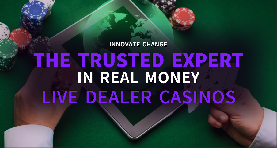 A person using a tablet with chips and cash