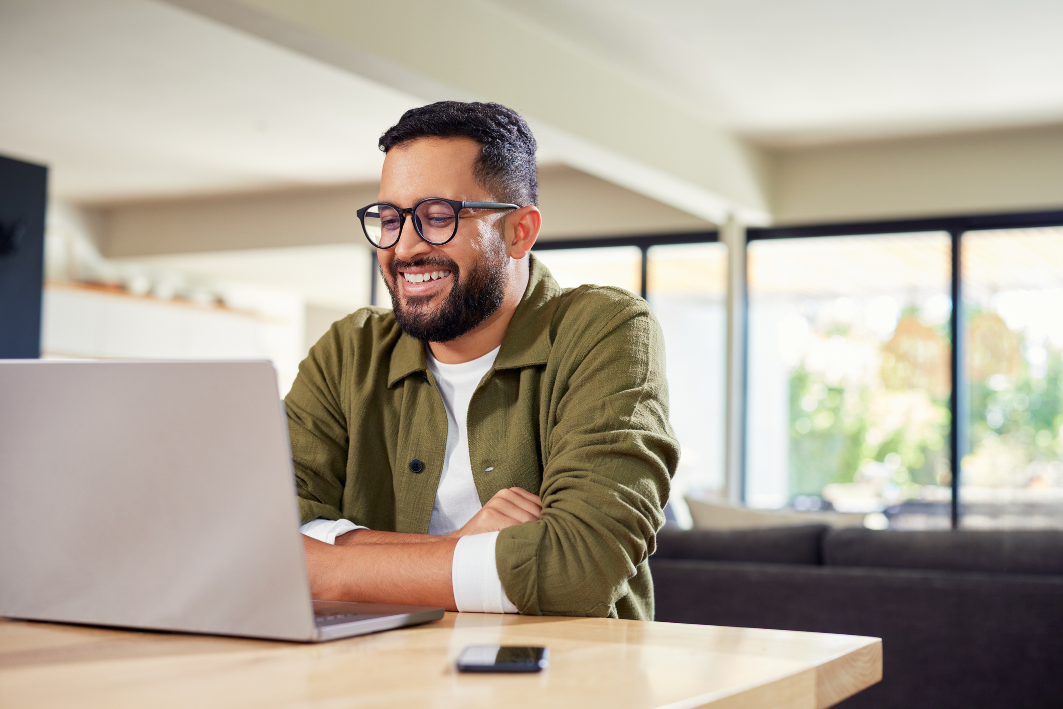 Happy man on computer