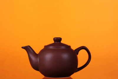 Classic chinese teapot of brown clay