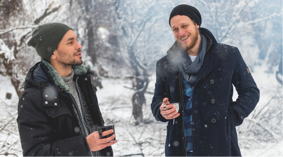Men chatting in snow
