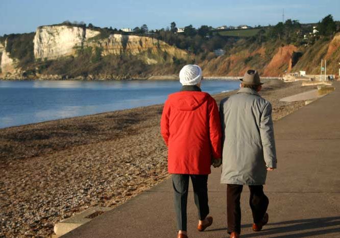 Couple Walking on Beach