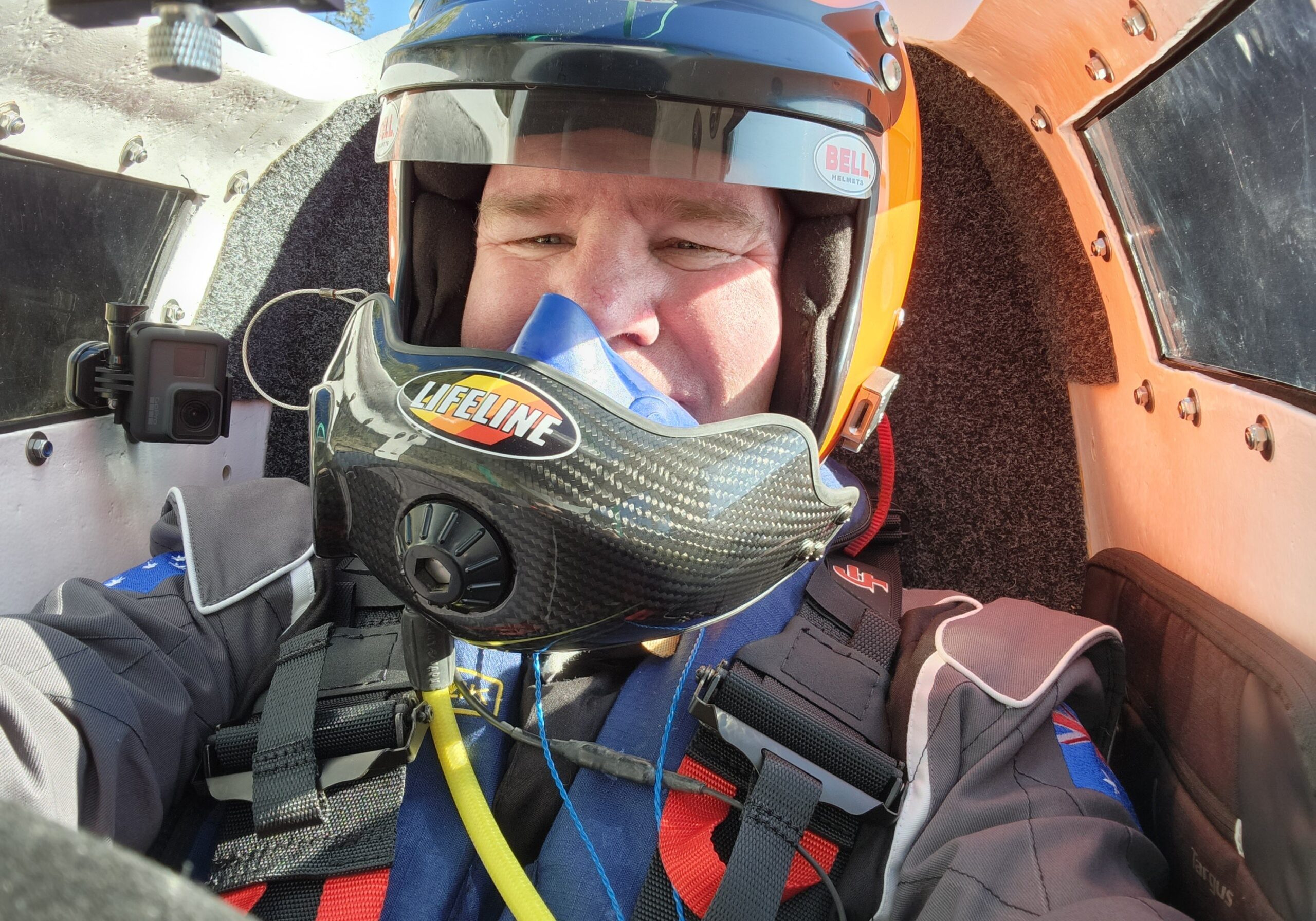 Dave Warby in the cockpit of his hydroplane Spirit of Australia II