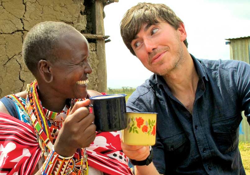 Simon Reeve enjoying a cuppa in Kenya