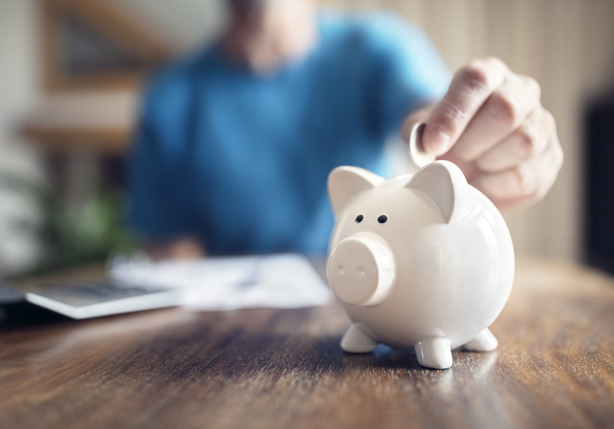 Financial health - man with piggy bank