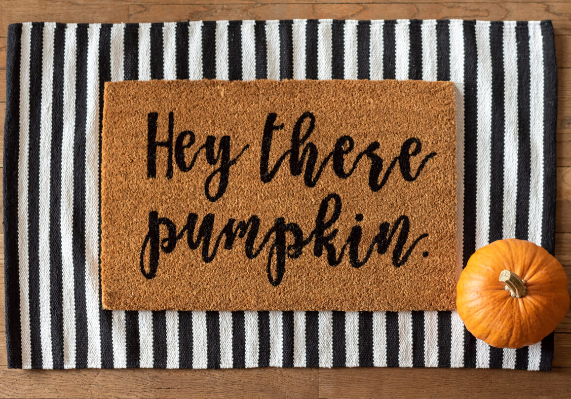 Cute fall rug and a pumpkin - stylish fall decor