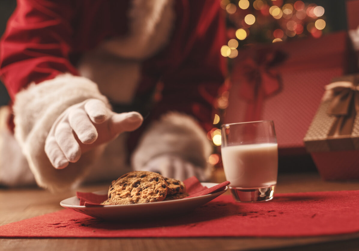 Santa Claus having a delicious snack