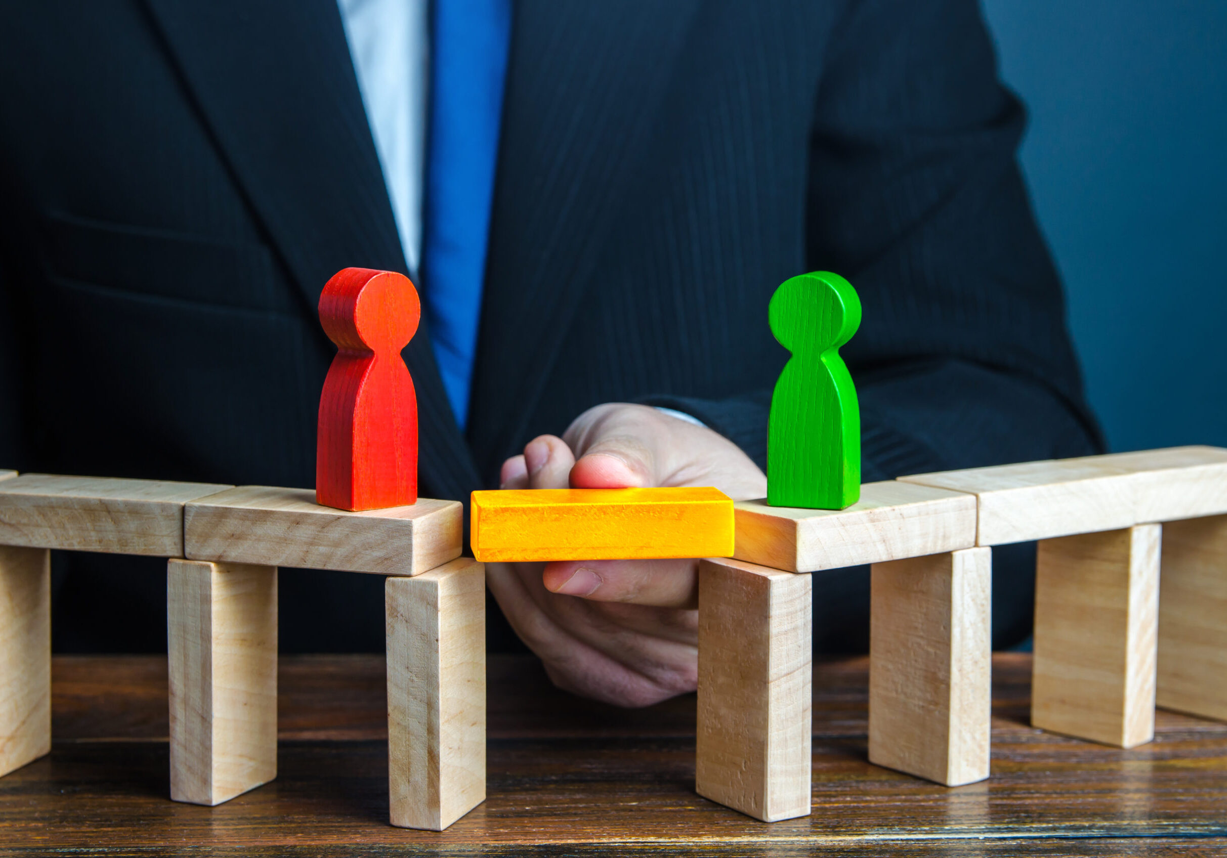 Mediator to remove the gap of understanding between people. Compromise dispute resolution. Build bridges improve relationships. Mediation of conflicting parties. Stop conflict escalation. Win-win