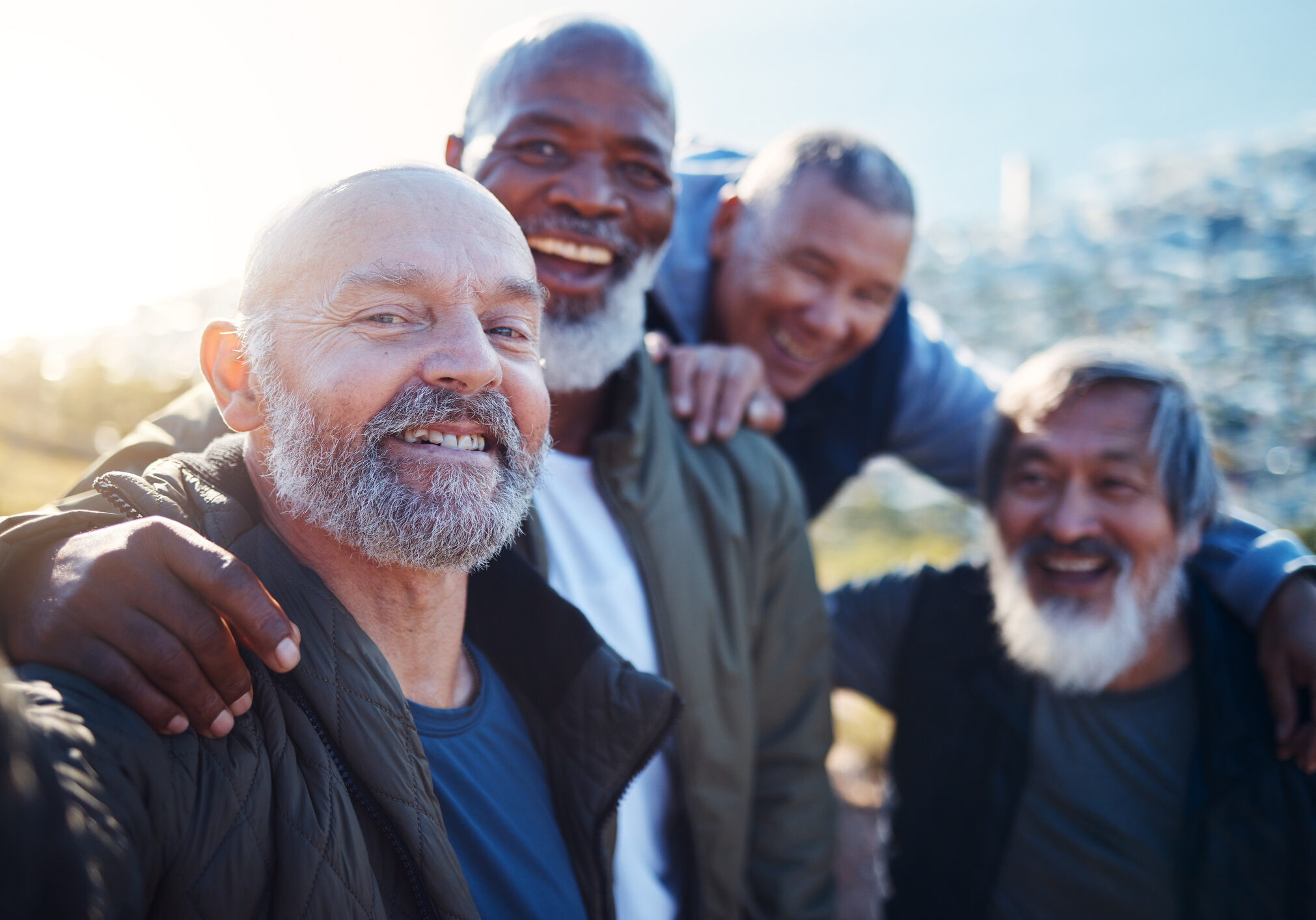 Senior hiking, selfie and nature walk of elderly men smile together in retirement. Friends, trekking adventure and happiness of old people outdoor for health, wellness and fitness on a journey