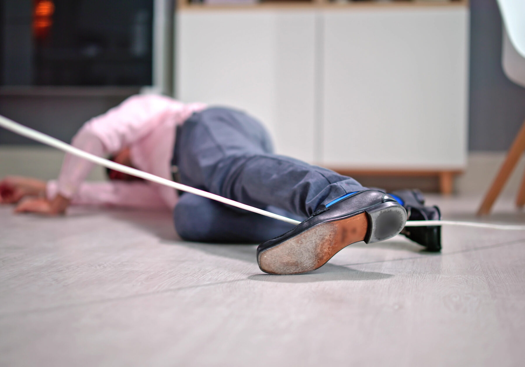 Wire Cord Trip Over And Fall. Feet Stumble On Cable