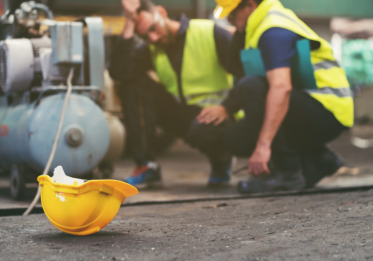 Male engineer worker get accident at work in industry factory. Health safe of work and safety first concept