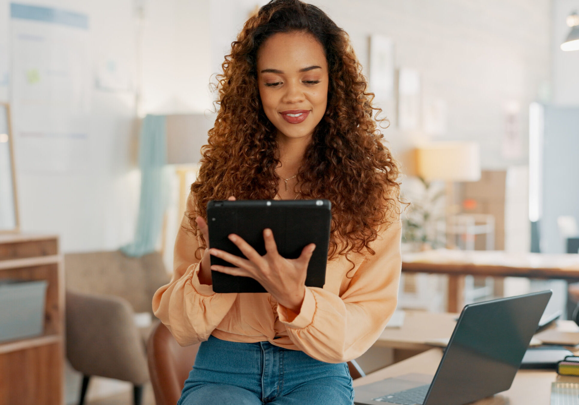 Tablet, logistics and fashion manager with a checklist in retail store clothes or clothing boxes inspection. Entrepreneur, shopping and small business owner writing stock delivery for quality control