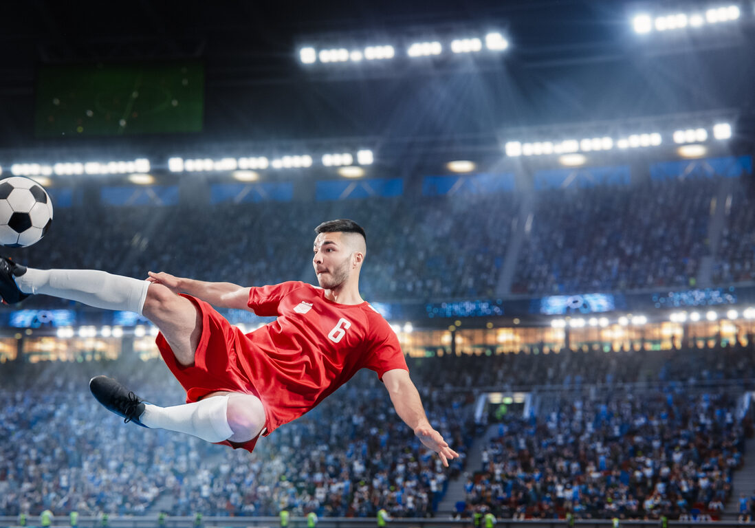 Aesthetic Shot Of Athletic Caucasian Soccer Football Player Doing Beautiful Overhead Kick On Stadium With Crowd Cheering. International Championship Final Match on Arena Full Of Loyal Fans.