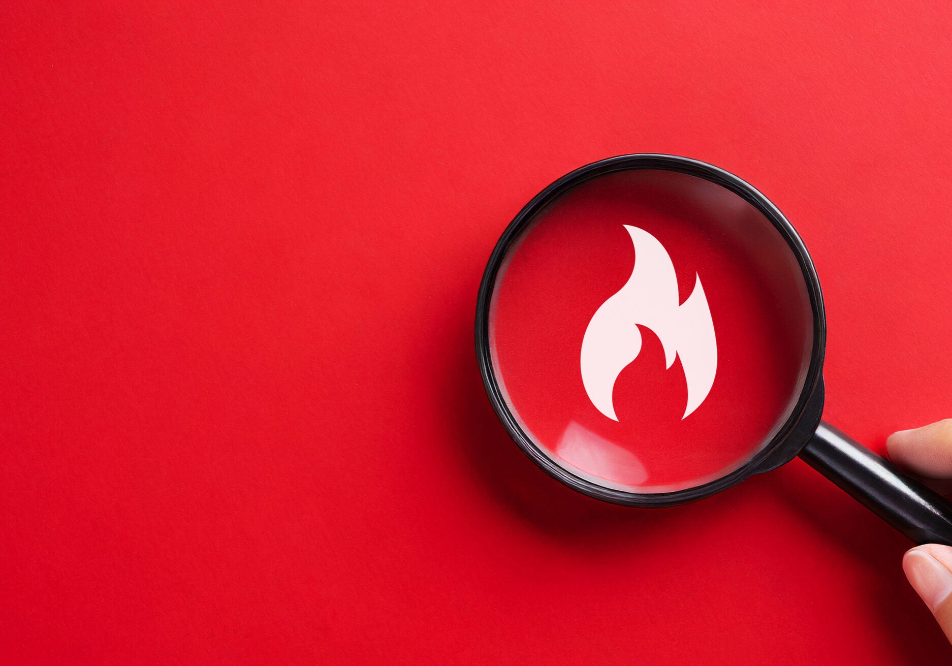 Magnifying glass with flame icon. Fire surveillance inspection and fire fighting concept.