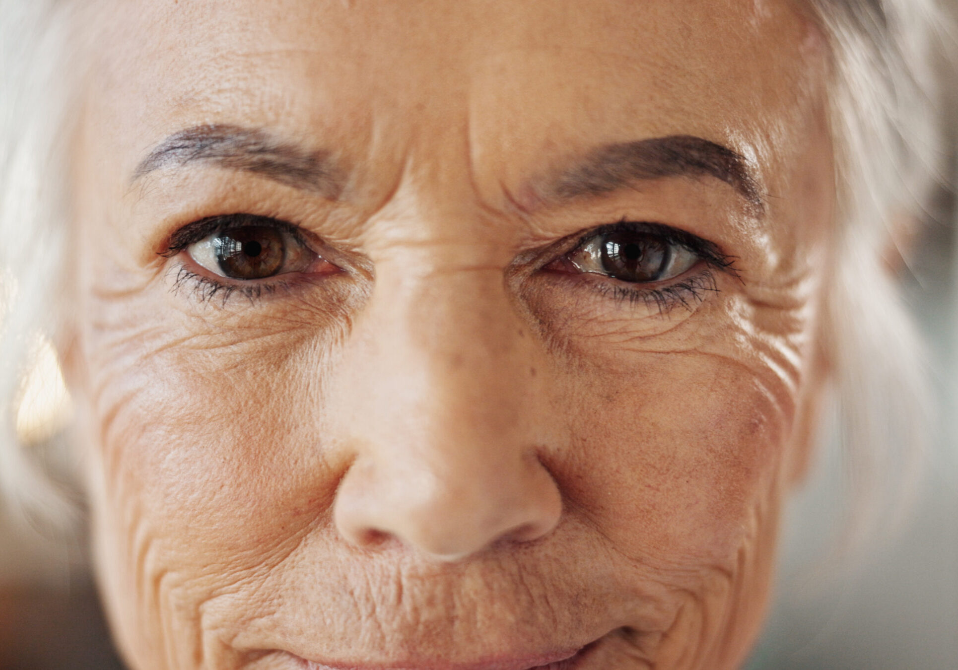 Senior woman, portrait and eyes with anti aging treatment, collagen facial results and microblading confidence. Beauty, face and cosmetics for wrinkles, skin hydration or dermatology with aesthetic