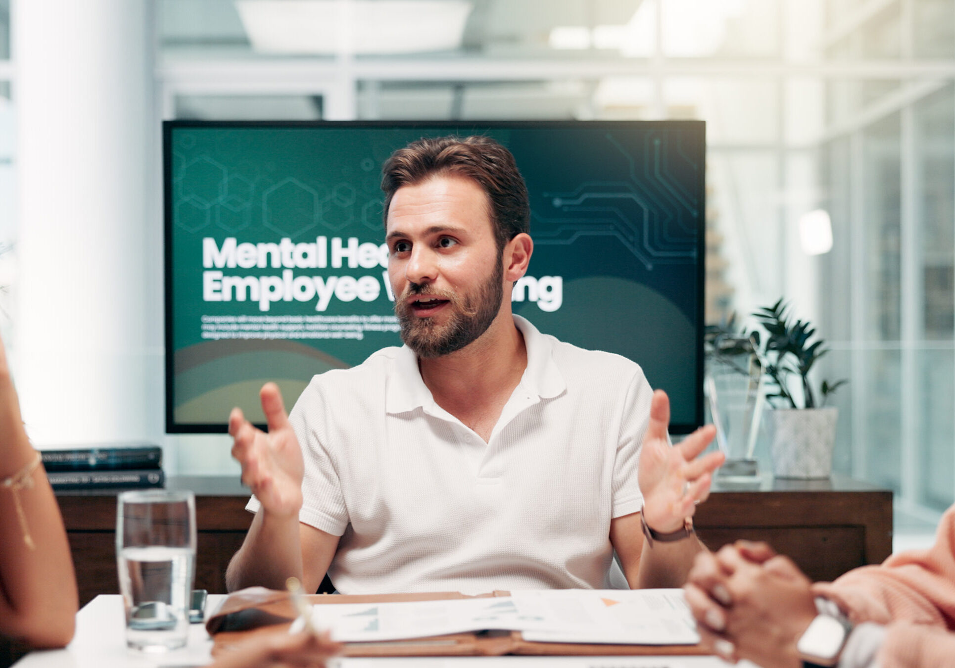 Collaboration, meeting and presentation with business people in boardroom of office for workshop. Human resources, mental wellbeing and psychology display with team in workplace for staff wellness