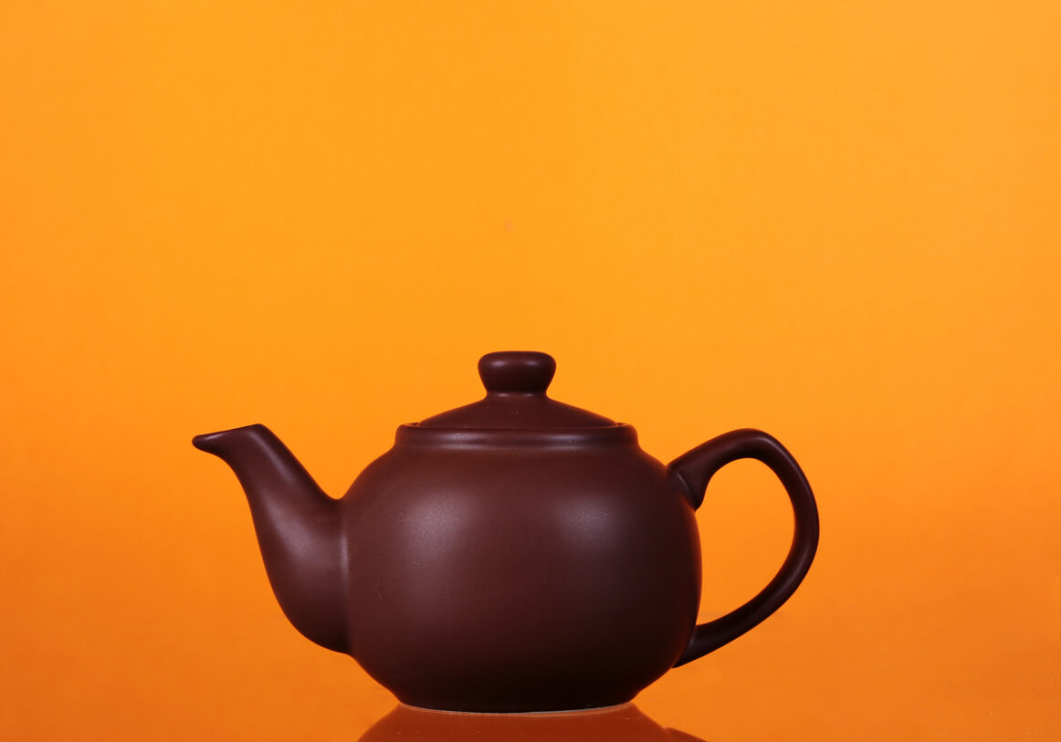 Classic chinese teapot of brown clay