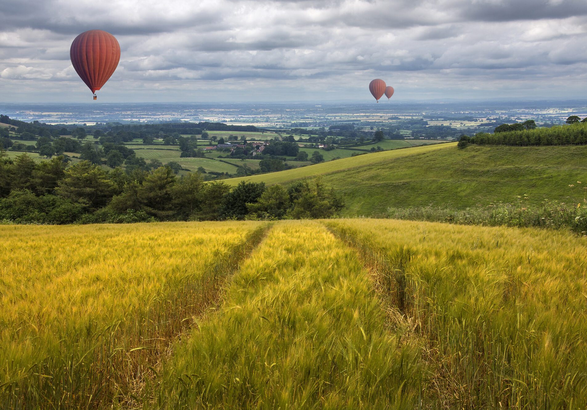 Hot air balloons drifting over the East Yorkshire Wolds in the United Kingdom