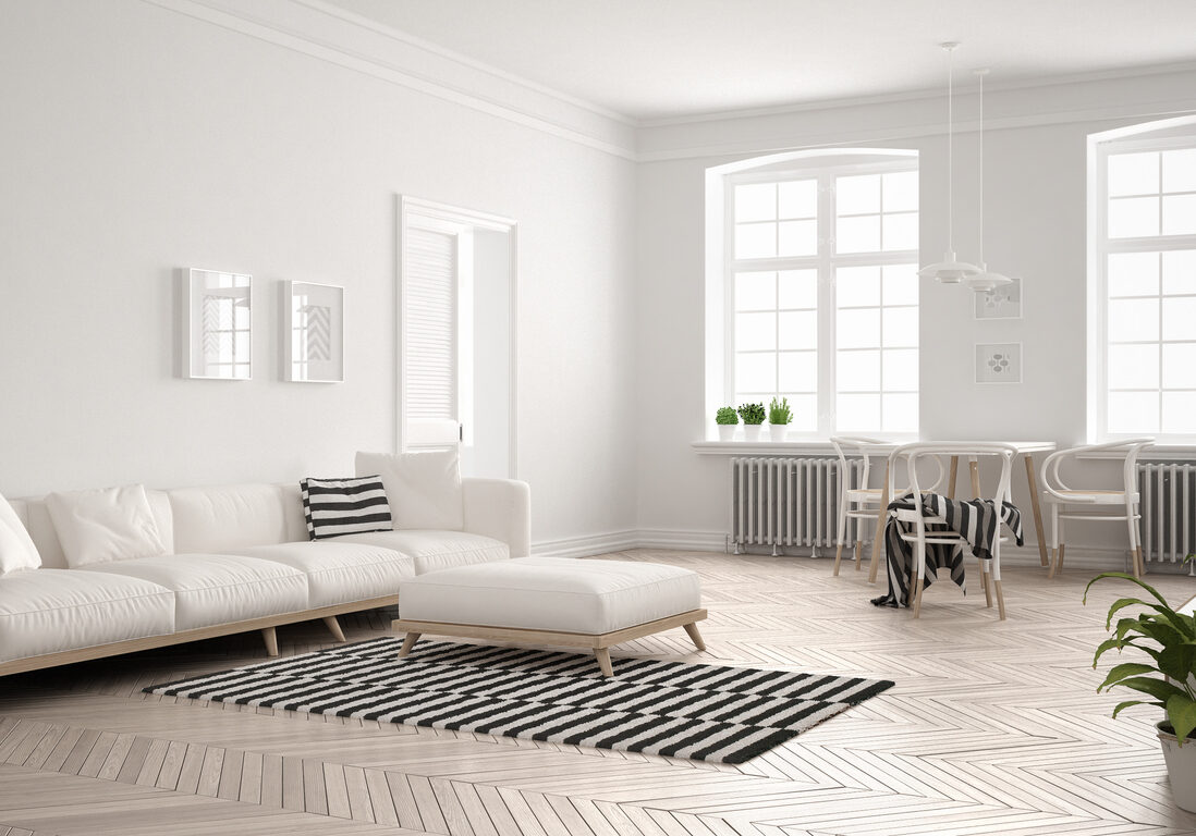 Bright minimalist living room with sofa and dining table, scandinavian white interior design