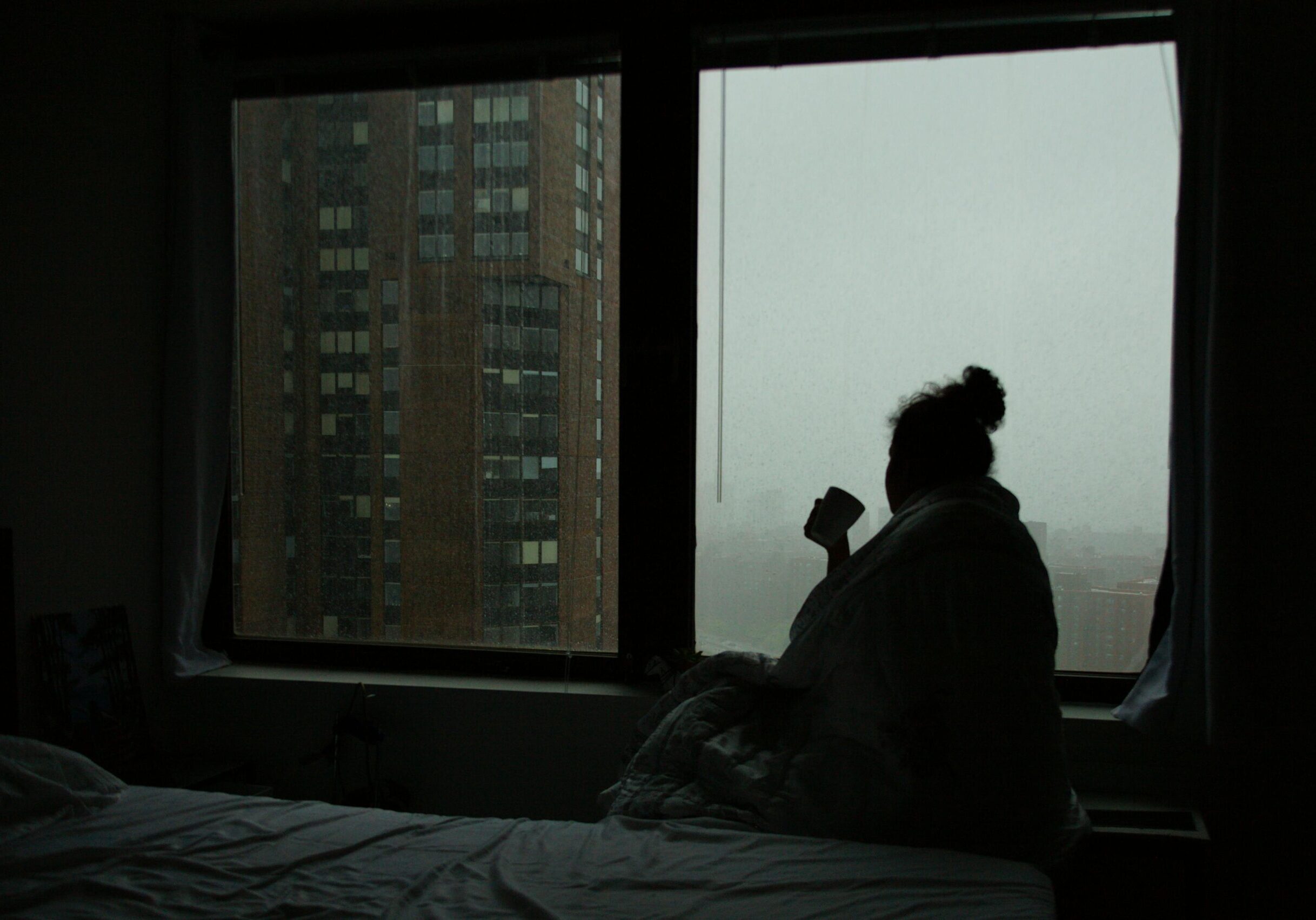 Woman in rainy northern city