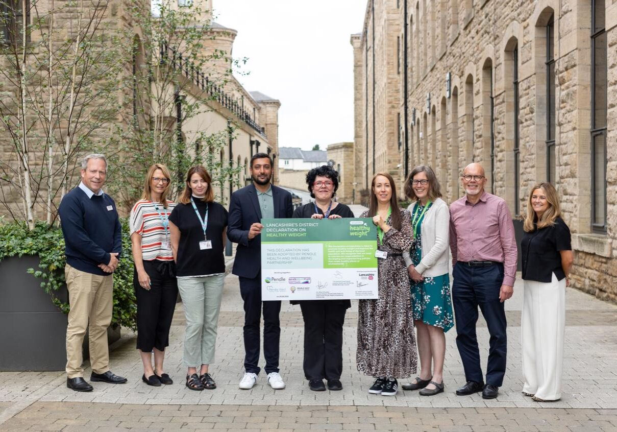 L-R Simon Gwynne, Chief Executive of Pendle Leisure Trust; Michelle Brides, Public Health Specialist for Lancashire County Council; Lisa Murray, Senior Public Health Practitioner for Lancashire County Council; Dr Irfan Chaudry, Clinical Director of Pendle West Primary Care Network and Chair of Pendle Health and Wellbeing Partnership; Tracey Noon, Operations Manager for Burnley, Pendle and Rossendale Council for Voluntary Service; Danielle Thorpe, Programme Officer for Pendle Borough Council; Gill Dickson, Policy and Programmes Manager for Pendle Borough Council; Robin Ireland, Research Director at Food Active and Nicola Calder, Food Active.
